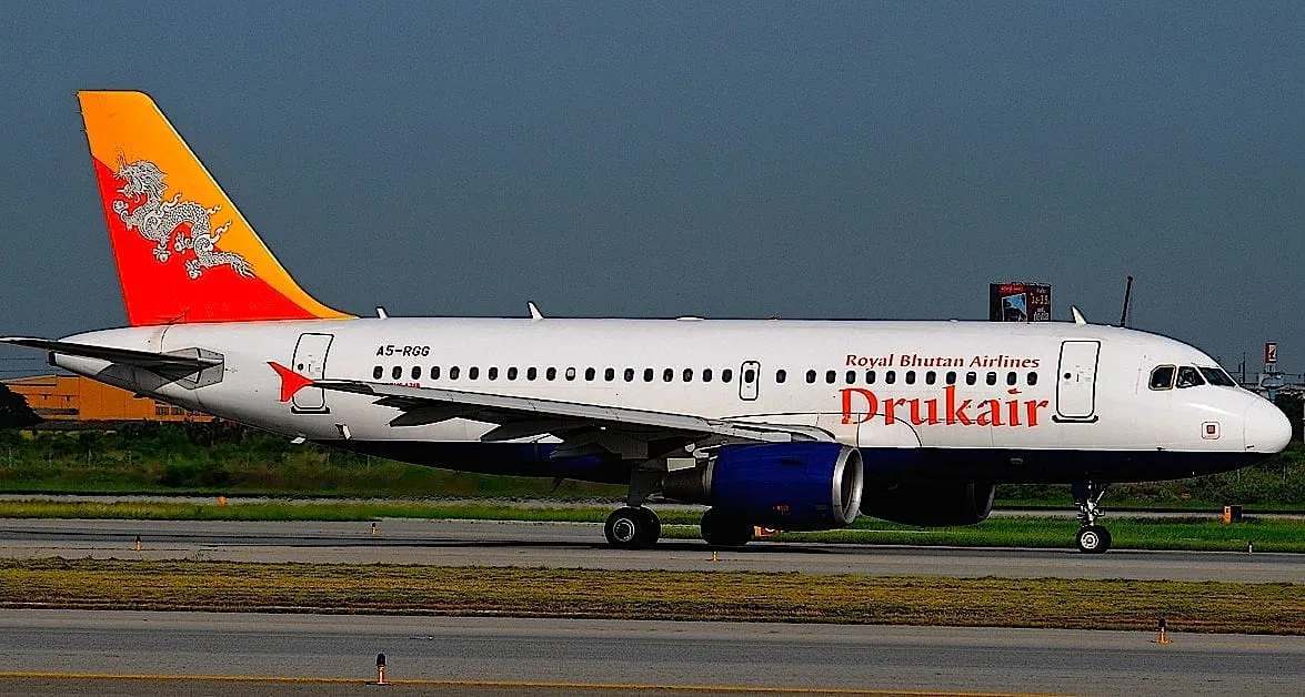 Drukair Royal Bhutan Airlines Airbus taxiing on an airport runway