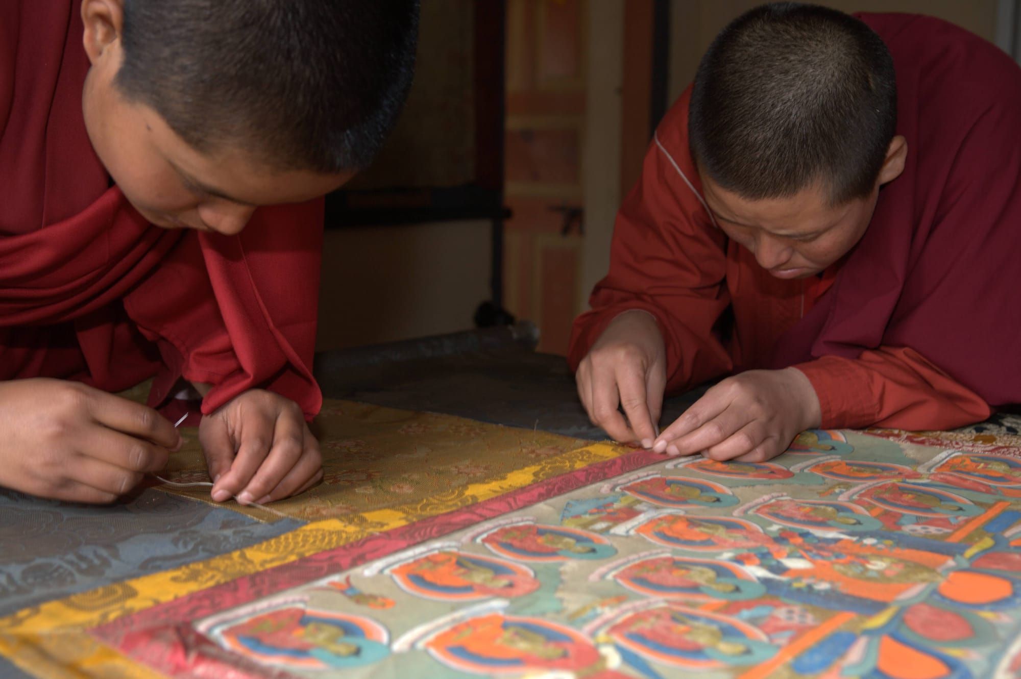 Monk stitching Thanka