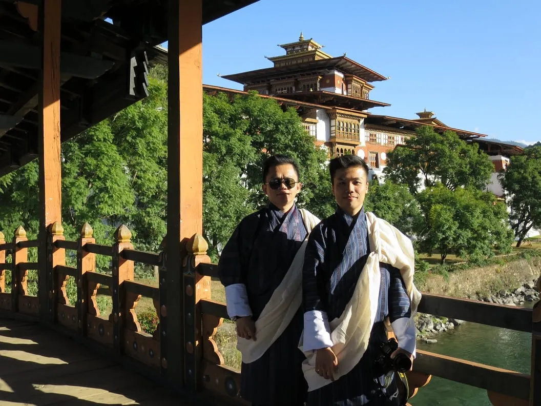 Ted &amp; Razlan dressed in Gho at the Punakha Dzong