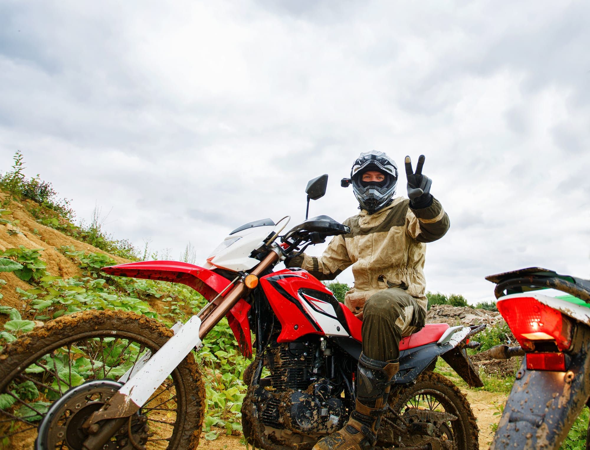 Motocross racers on landscape